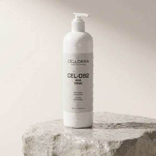 Cellorra AHA Resurfacing Tonic on wet stone pedestal