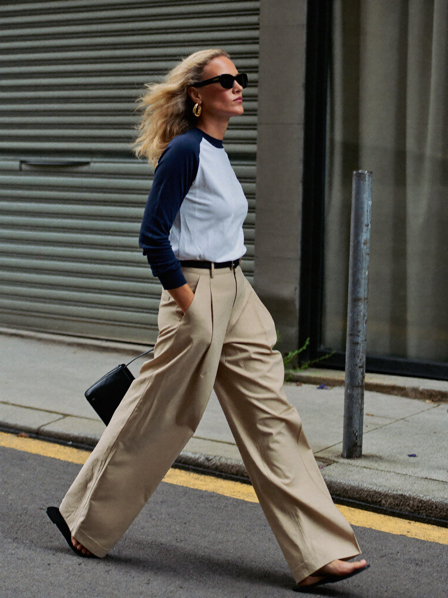 Model walking in Wide-Leg High-Waist Pants